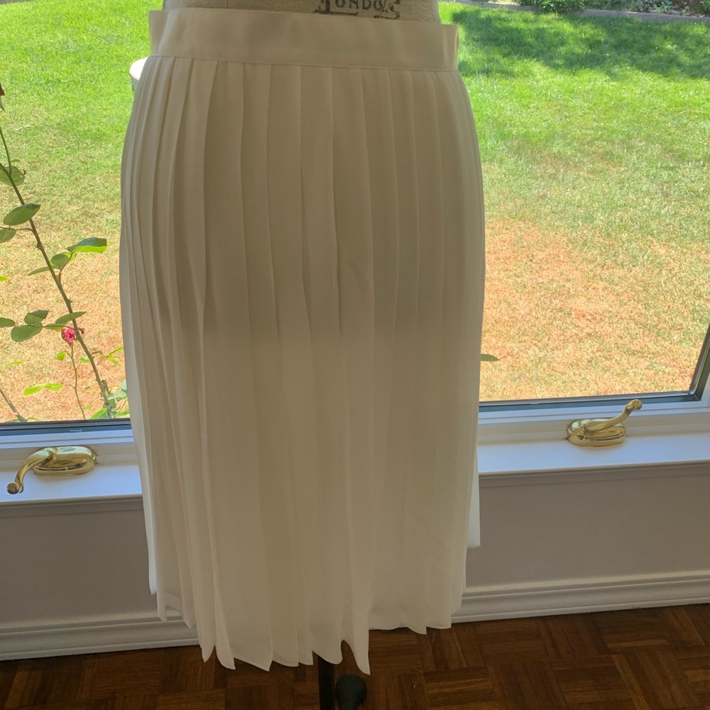 White skirt.